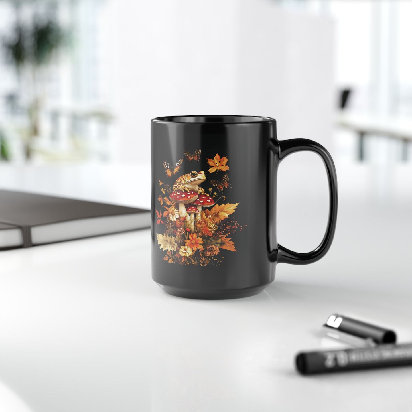 Autumn Frog and Mushroom Magic Mug | Enchanting Black Ceramic Coffee Cup